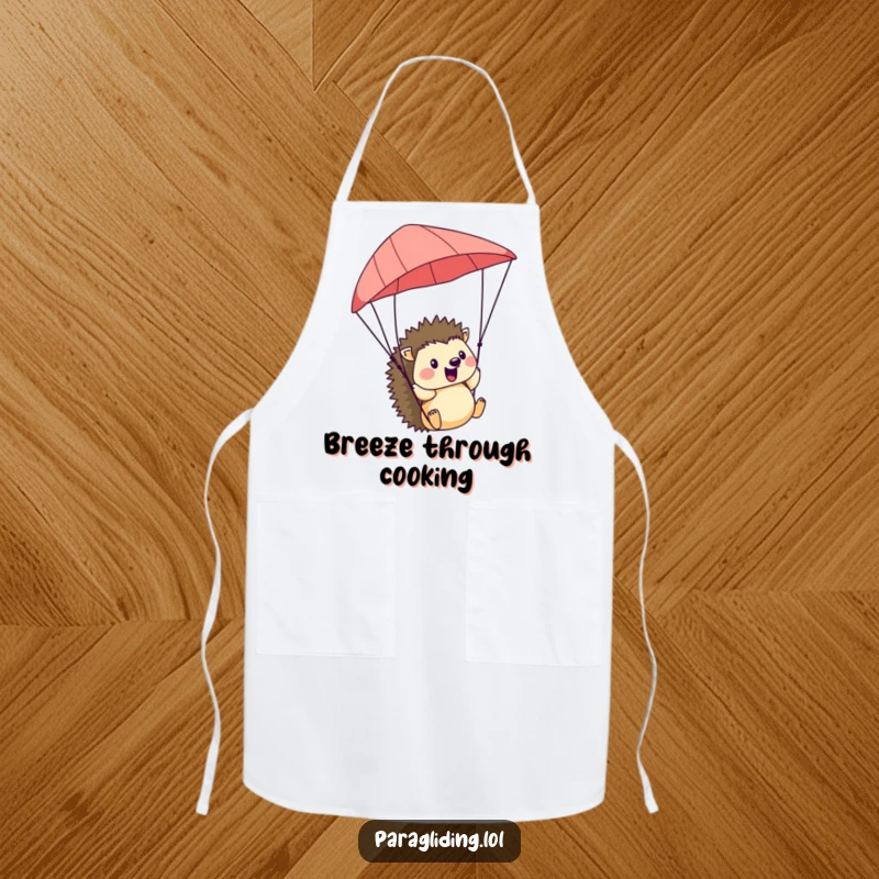 Funny Hedgehog Apron: A practical apron with a funny illustration of a cheerful hedgehog paragliding, enjoying the breeze happily.