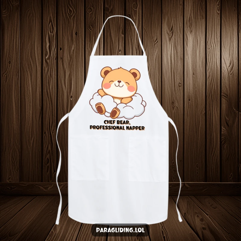 Funny apron showing a happy bear floating peacefully on clouds, perfect for a joyful cooking or crafting session.