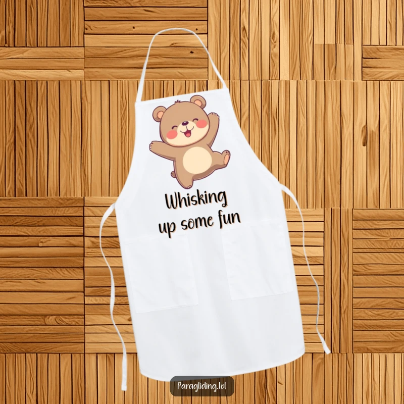 Funny playful bear bobs joyfully in the air on a kitchen apron, ready for joyful culinary adventures.