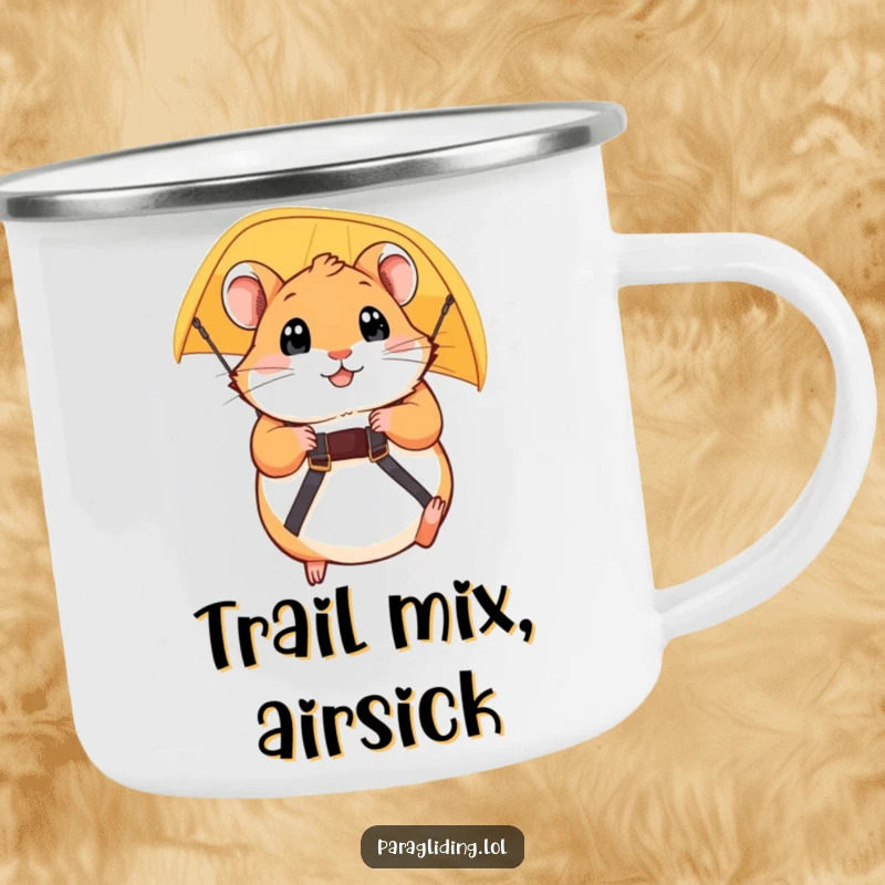 Funny camping mug with a plump hamster gripping paraglider straps, eyes wide, ready for a humorous outdoor adventure. Gift.