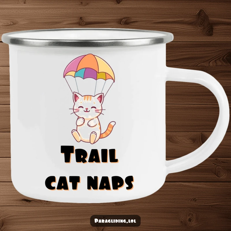 Funny camping mug featuring a happy cat serenely paragliding under a colorful paraglider, ready for outdoor calm.