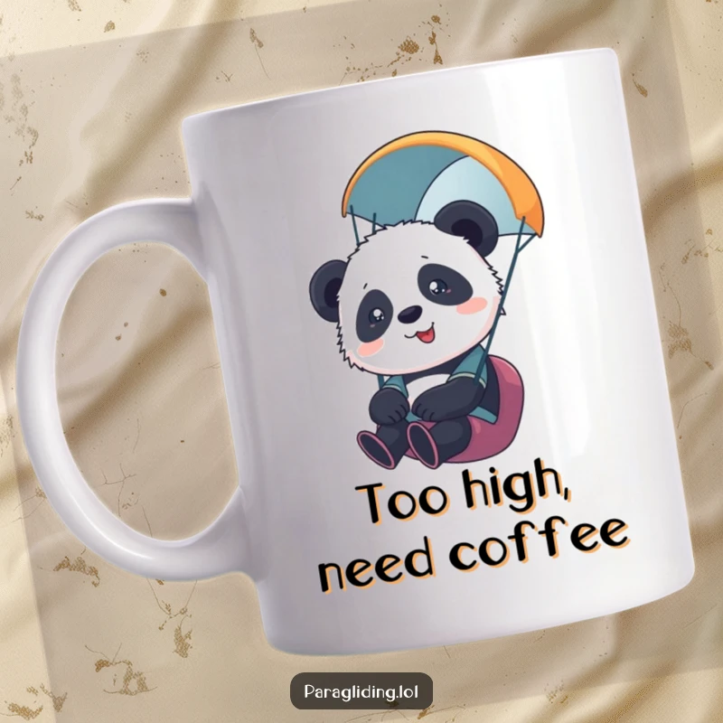 Funny paragliding mug with a cute, overwhelmed panda cub enjoying a thrilling, high-altitude adventure with wide eyes. Perfect gift.