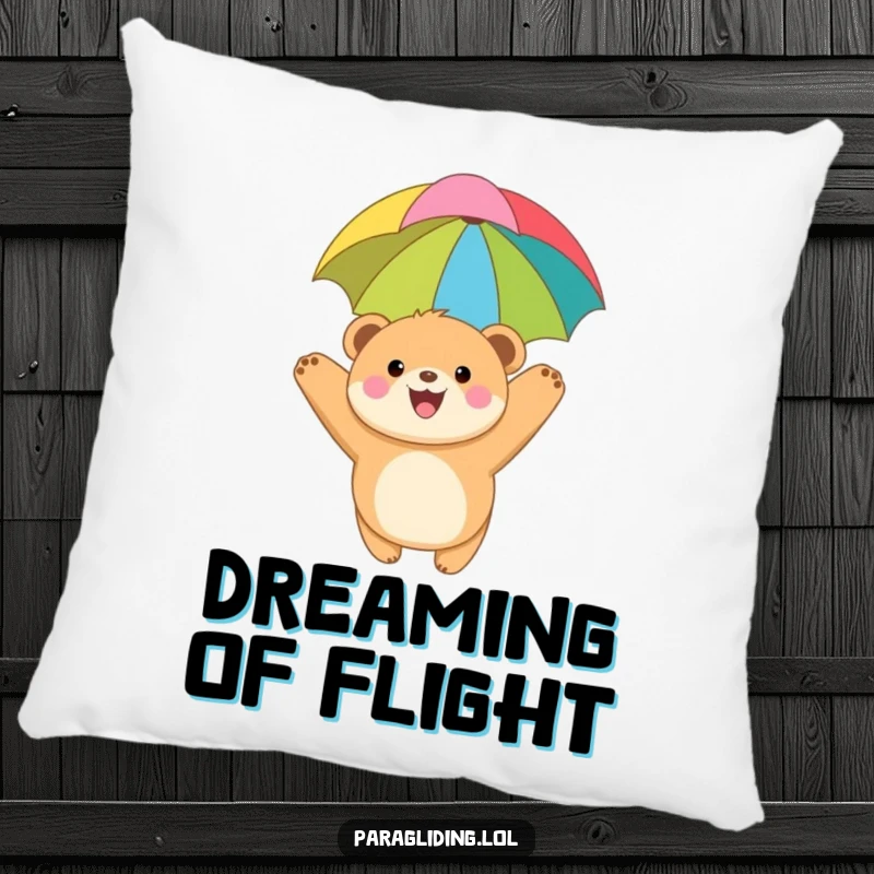 Funny pillow with a joyful, round bear cub paragliding under a colorful canopy, offering comfort and a touch of adventurous whimsy to any room.