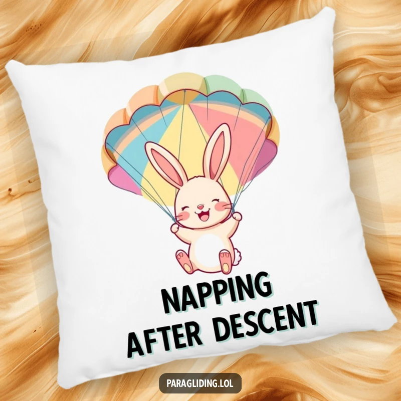 Funny pillow: A cheerful bunny dangling with delight from a colorful parachute. Soft, plush, and humorously adventurous home decor.
