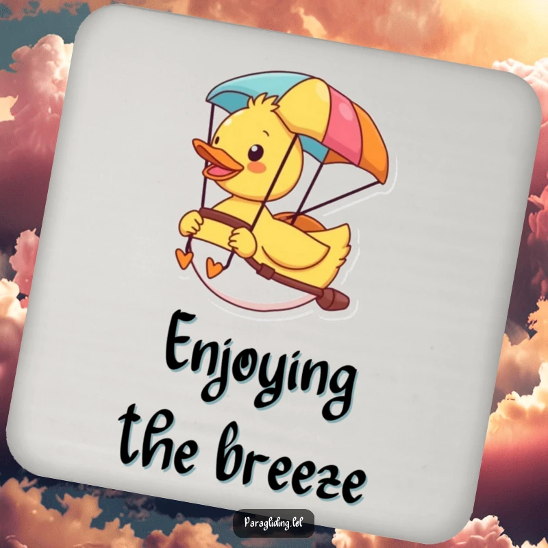 Funny drink coaster featuring a cheerful duck enjoying the view from its colorful paraglider, adding a touch of fun.