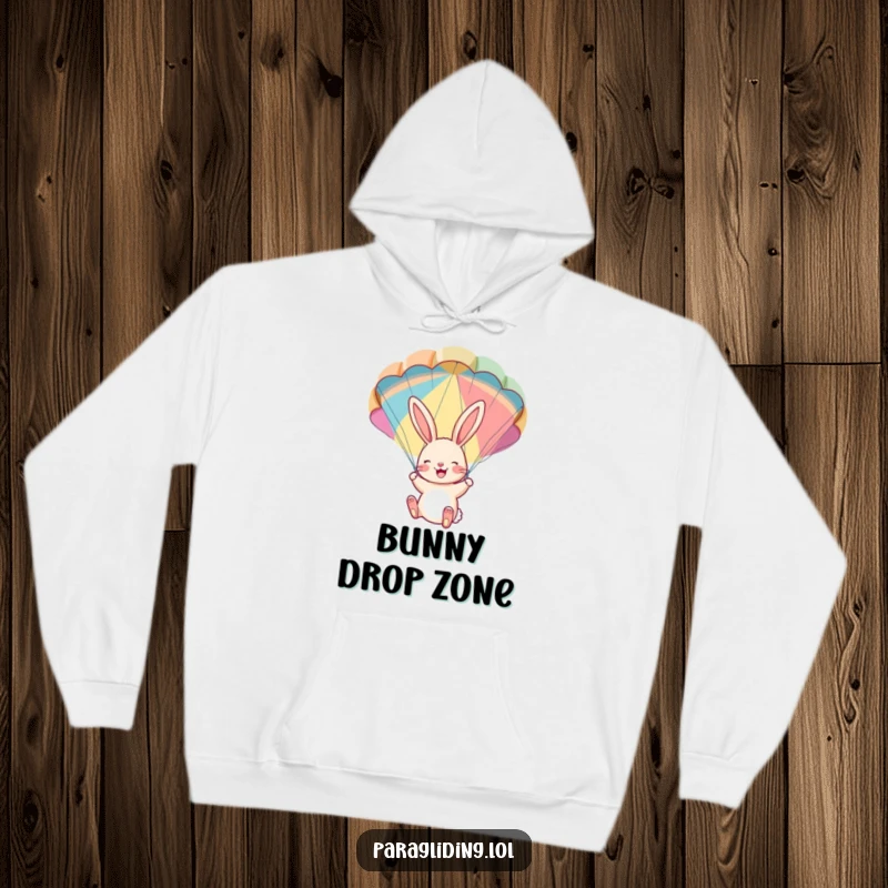 Funny hoodie: A cheerful bunny dangling with delight from a colorful parachute. Soft, warm, and humorously adventurous.