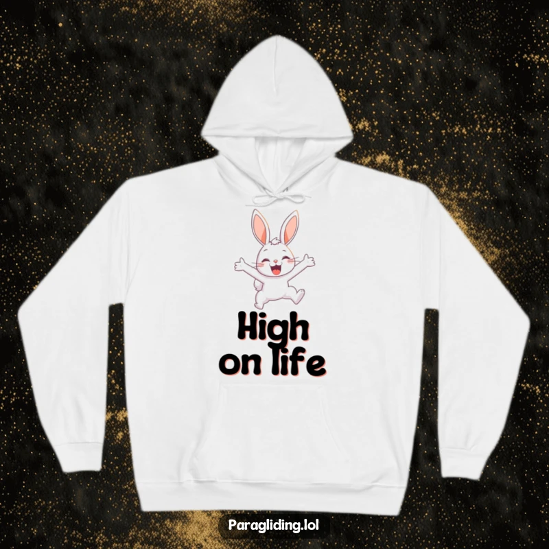 Funny hoodie featuring a delighted bunny soaring through the sky, offering cozy warmth and humorous joy.