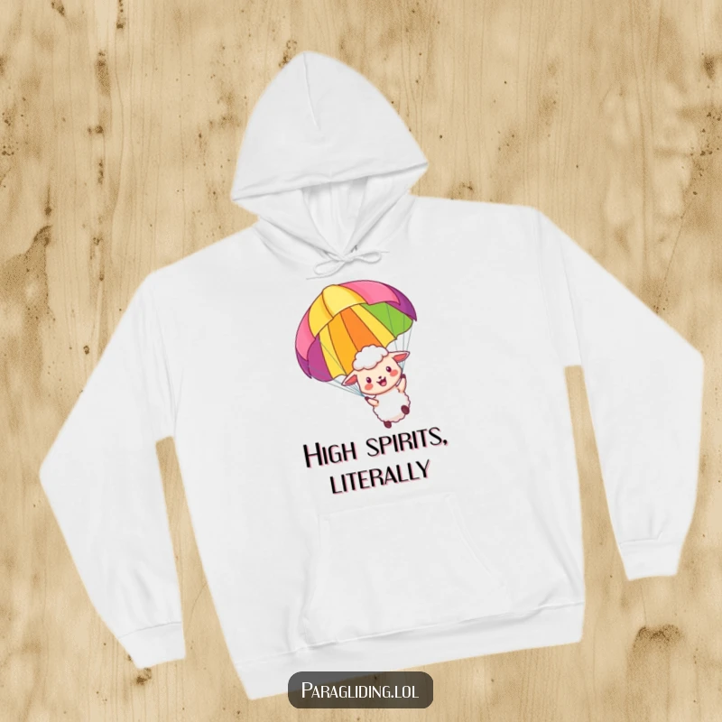 Funny hoodie featuring a happy sheep paragliding, offering cozy warmth and humorous adventure for the spirited individual.