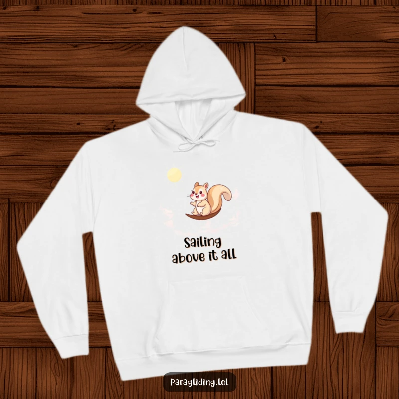 Funny hoodie with a happy squirrel peacefully sailing through clouds, offering cozy warmth and a touch of fun.