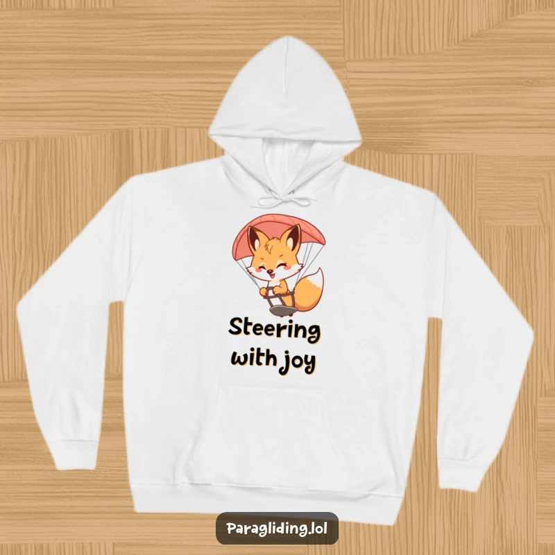 Funny Fox Hoodie: A cozy hoodie featuring a bouncy fox with a smile, steering a paraglider with playful grace.