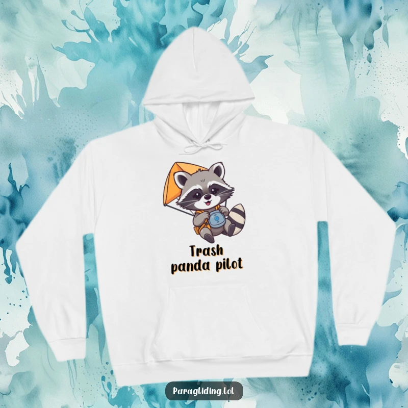Funny mischievous raccoon playfully tugging on paraglider controls, on a cozy hoodie, a perfect funny gift.