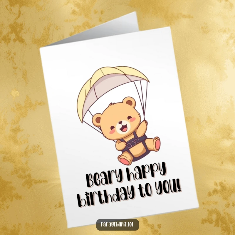 Funny Free Printable Happy Birthday card: A happy bear cub paragliding with a huge smile, enjoying the scenic flight.