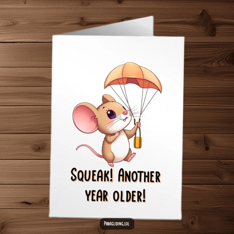 Funny Free Printable Birthday Card: A curious mouse looks amazed while paragliding high in the sky.