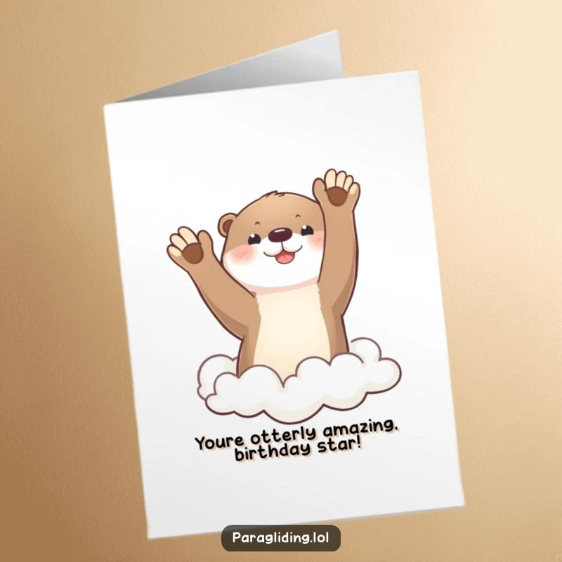 Funny Free Printable Birthday Card: Cute otter waving joyfully from a cloud, spreading birthday cheer. Instant downloadable art.