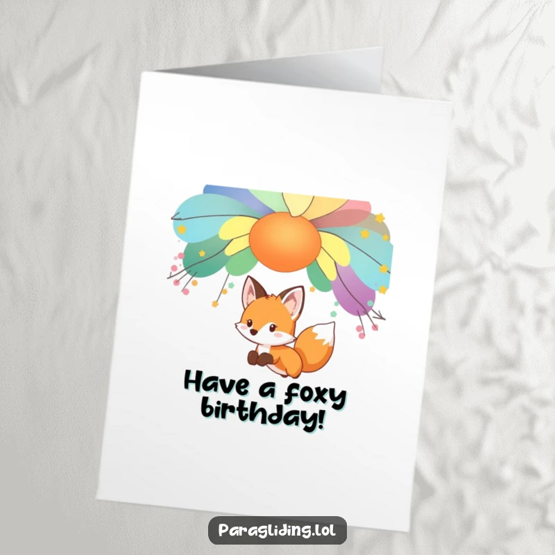 Funny Free Printable Birthday Card: A curious fox gently gliding under a colorful canopy, full of wonder. Downloadable.