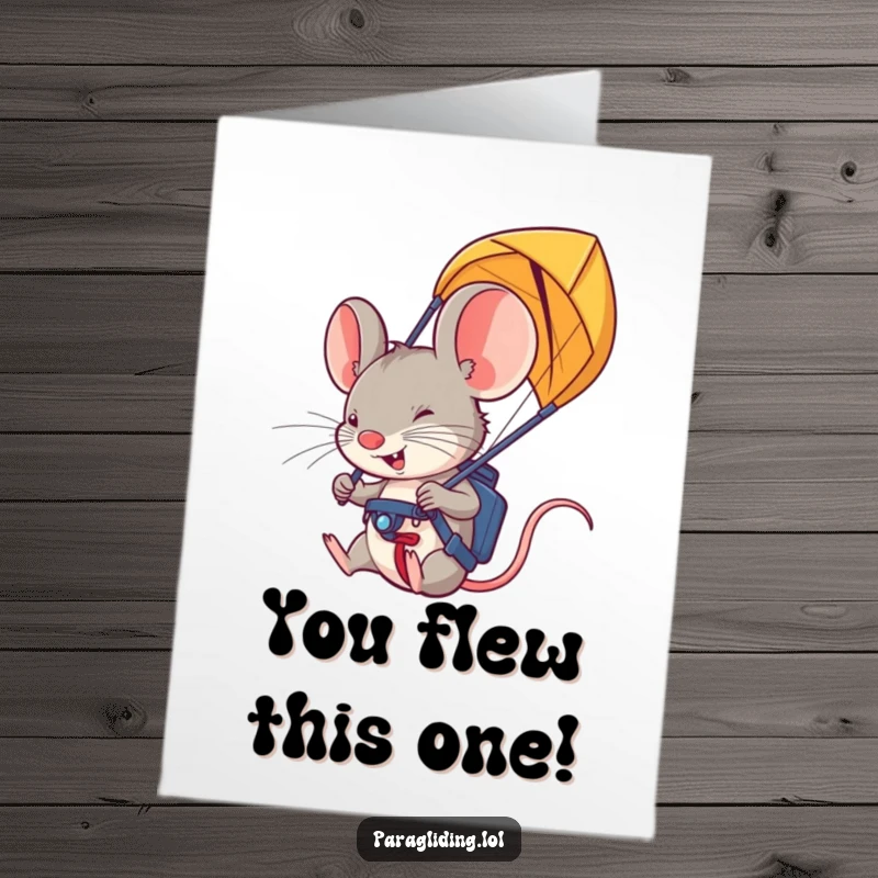 Funny Free Printable Congratulations Card showing a determined mouse gripping paraglider handles, celebrating a successful flight, downloadable art.