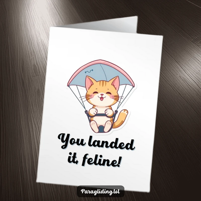 Funny Free Printable Congratulations Card: A poised cat nimbly steers its paraglider, showcasing mastery and confidence in flight.