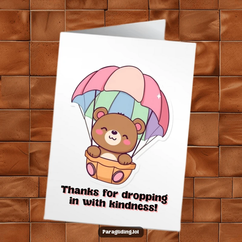 Funny Free Printable Thank You Card of a happy bear peacefully descending in a colorful parachute, perfect for expressing thanks.