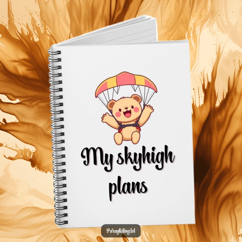 Funny bear cub notebook, a journal featuring a cub waving from a paraglider, ideal for notes.