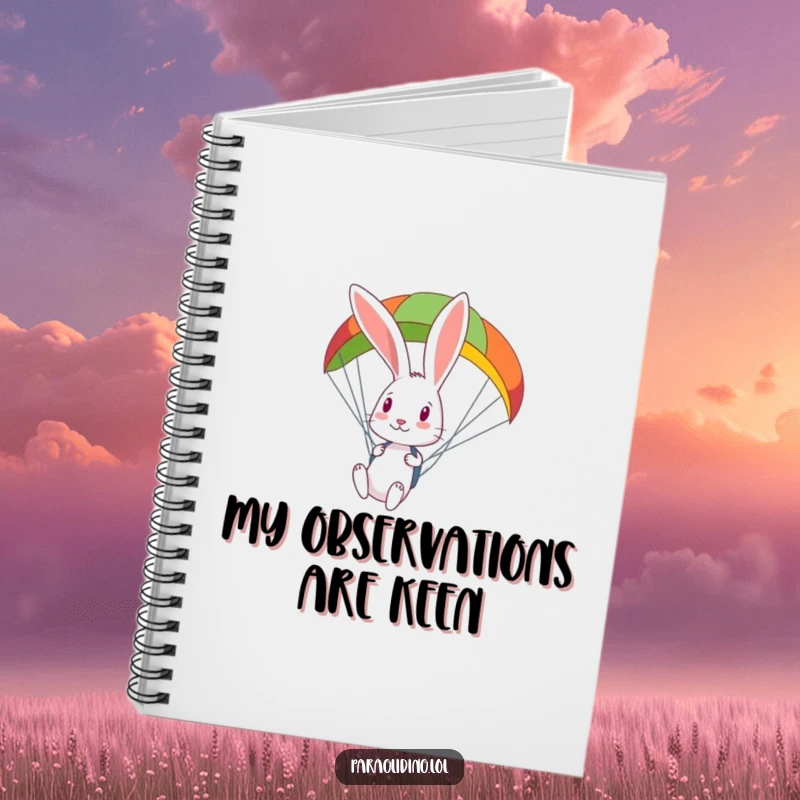 Funny curious rabbit looks down from a colorful paraglider on a notebook cover, perfect for jotting down curious thoughts.