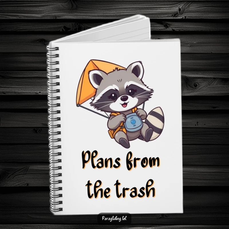 Funny mischievous raccoon playfully tugging on paraglider controls, on a notebook cover, a useful funny gift.