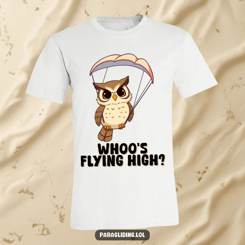 Funny Owl T-Shirt: A determined owl wearing a paraglider harness, looking down with keen eyes, symbolizing wisdom and flight.