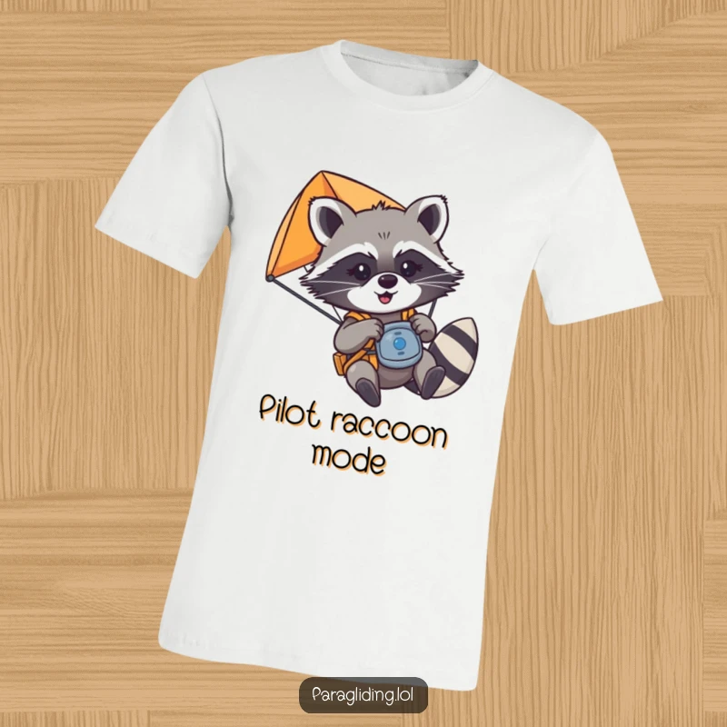 Funny mischievous raccoon playfully tugging on paraglider controls, mid-flight, printed on a t-shirt, a fantastic funny gift.