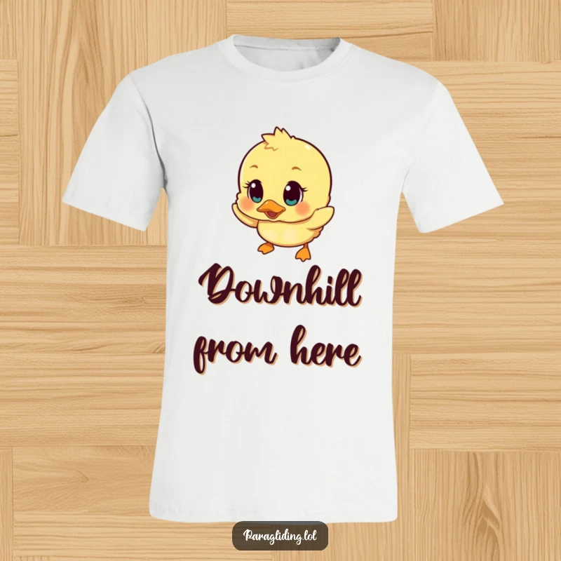 Funny t-shirt featuring a tumbling duckling with big, surprised eyes, expressing a moment of comical shock and endearing vulnerability.