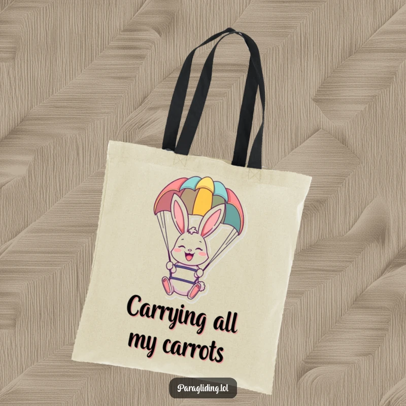 Funny tote bag featuring a happy bunny paragliding, perfect for carrying essentials with a cheerful theme.