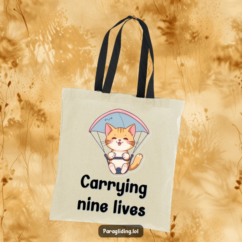 Funny confident cat paragliding nimbly on a durable tote bag. A chic and practical funny gift for cat enthusiasts.