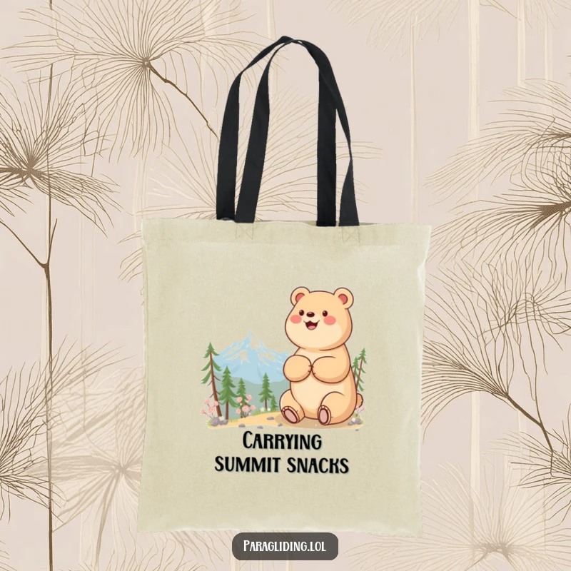 Funny tote bag featuring a beaming bear taking in a serene mountain vista, perfect for outdoor enthusiasts.