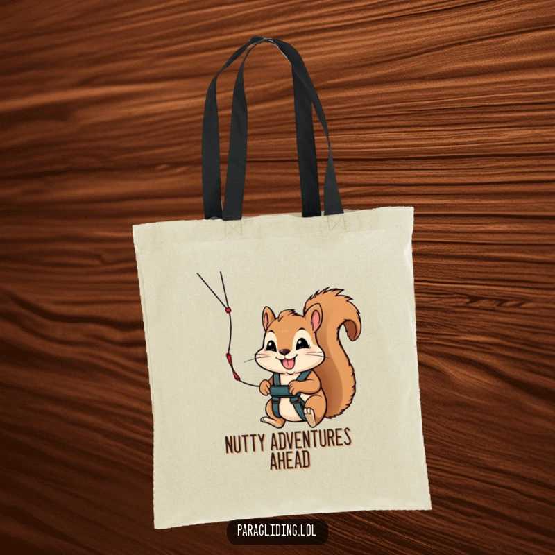 Funny tote bag illustrated with a determined squirrel confidently holding a paraglider handle, ready for any journey with a cheerful expression.