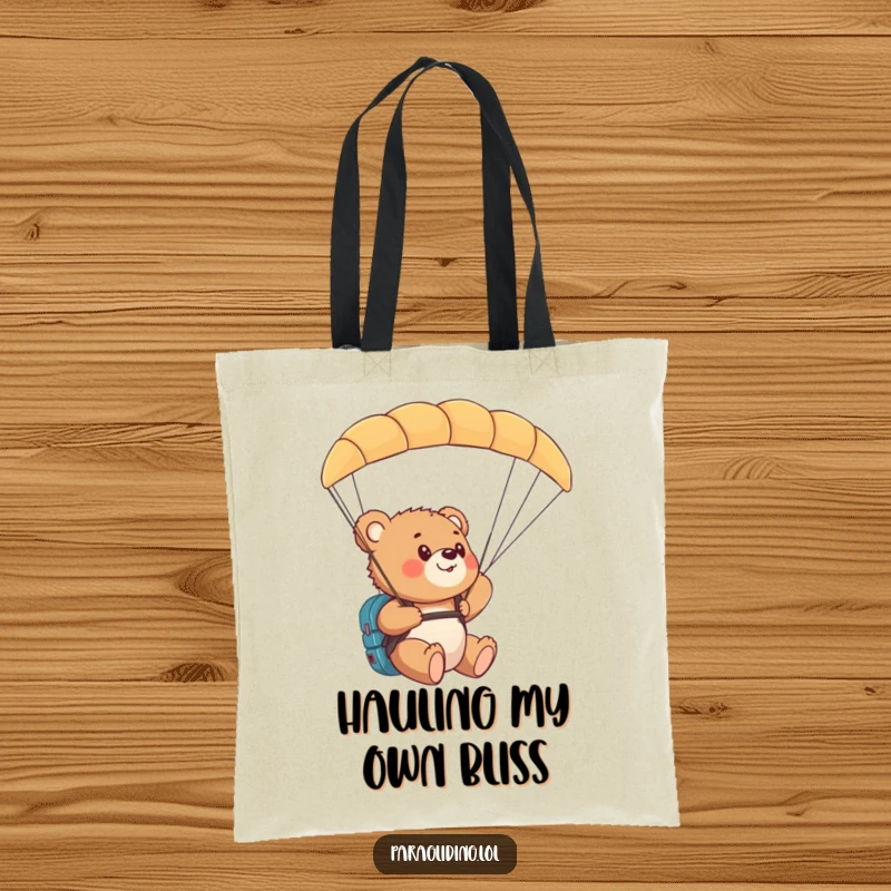 Funny bear cub paragliding tote bag with a cub amazed by the view from a paraglider.